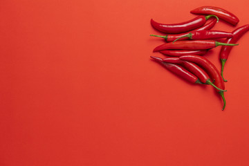 Group of red narrow long spicy chili peppers