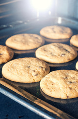 Tasty cookies on a baking tray