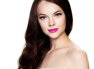 Fototapeta premium Beautiful brunette woman with beauty lashes and pink lipstick healthy skin isolated on white
