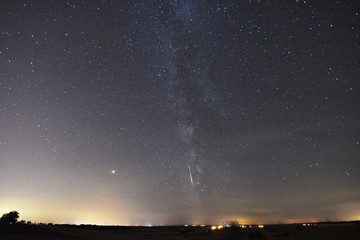 Milky way with Mars and a falling star Perseids