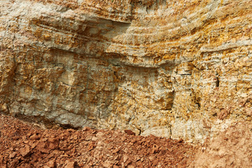 Naklejka premium the texture of the dry clay at the sea cliff, sea coast with high hills, beautiful wild landscape
