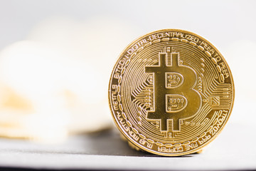 Bitcoin close-up on shining bright background