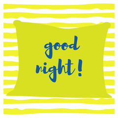 Green pillow with stars and moon. Background of yellow stripes