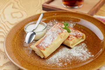 Russian pancakes healthy breakfast dish close up