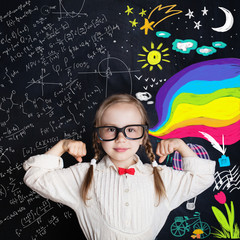 Kid of school age on arts and science background. Little girl student showing his power