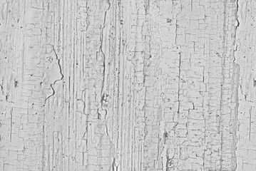 The texture of an old board with cracked paint