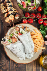 Gyros souvlaki wrapped in a pita bread