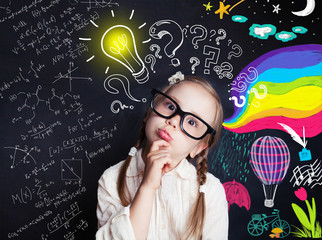 Pensive child school student with yellow lightbulb and school and childhood supplies design...