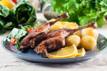 Duck legs confit with boiled potatoes