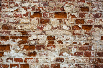 Aged ancient brick street wall background, grunge texture