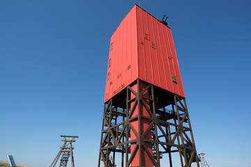 Oil drilling rig on blue sky