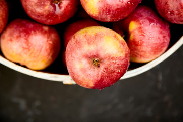 Fresh organic red apples in a basket