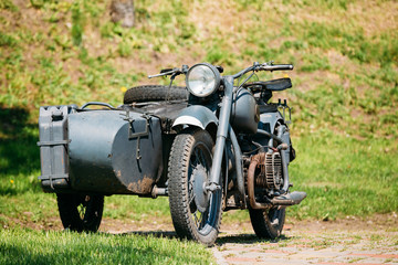 Naklejka premium Old Rarity Tricar, Three-Wheeled Gray Motorcycle With A Sidecar 