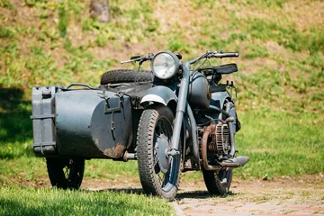 Rolgordijnen Old Rarity Tricar, Three-Wheeled Gray Motorcycle With A Sidecar  © Grigory Bruev
