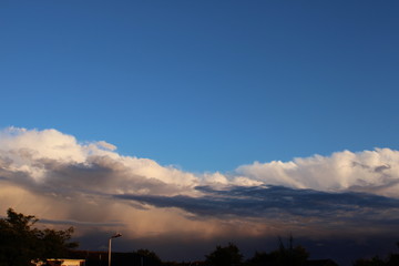 Fototapeta na wymiar Post storm clouds over Essex town