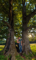 Couple under big oak tree