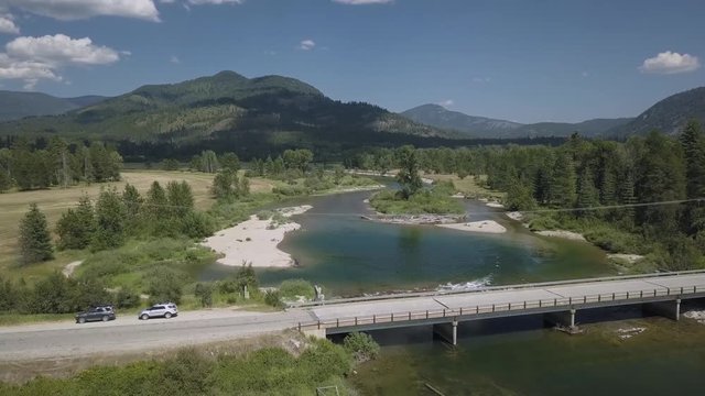 Aerial View Crossing Small Bridge Over River Swimming Hole- Priest River Idaho