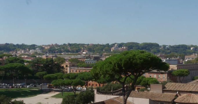 Pan view of the Italian capital city, Rome, filmed from Palatino hill,on a sunny autumn day, in Italy