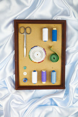 Sewing accessories in a frame