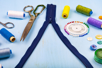 Unbuttoned zipper and sewing accessories