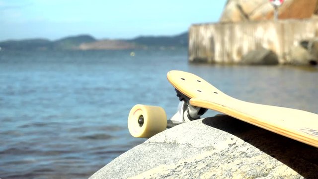 Promotion of longboard at the beach with Sea at the background Norway, Kjerringvik,