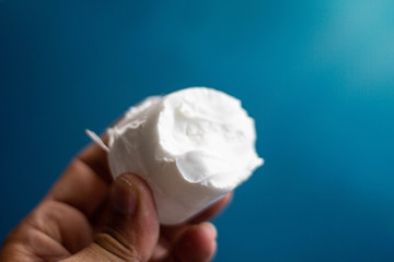 The silhouette of the photographer stands in the morning.