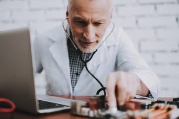 Computer Doctor in White Uniform with Stethoscope.