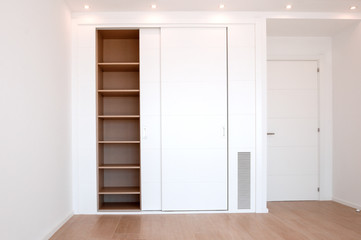 Empty built-in wardrobes. New house, empty rooms.