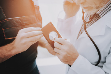 Computer Doctor in White Uniform with Stethoscope.