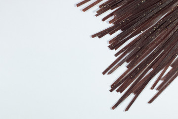 black organic pasta with grain and cereal  . food background