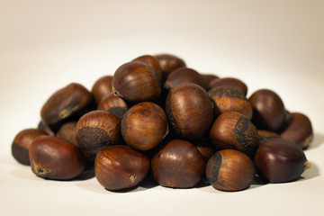 brown ripe chestnuts background