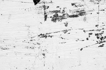 Wall fragment with scratches and cracks