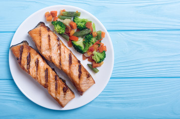 Grilled salmon fish with vegetables