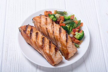 Grilled salmon fish with vegetables
