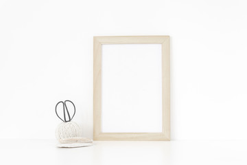 Wood frame mockup A4 in interior. Minimalism, vintage. Frame mock up poster or photo frame for bloggers, social media, lettering, art and design, text. Background