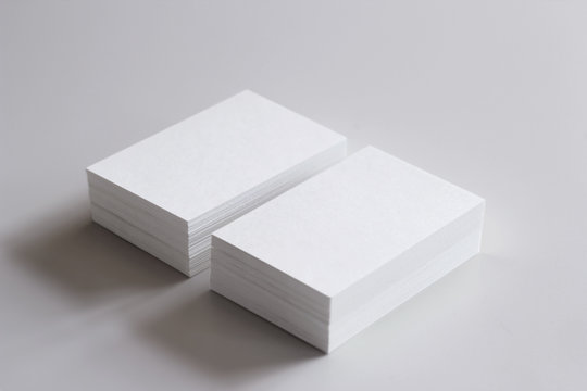 two blank business card stacks