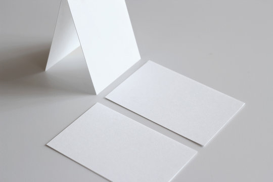 blank business cards flat and arranged as a pyramid