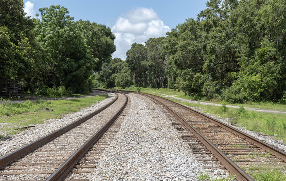 Summerfield, Florida, USA, 2018. Railroad signals and track passing through North Florida countryside.