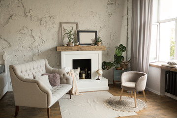 Fototapeta na wymiar Interior of cozy living room in modern design with fireplace