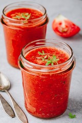 Red Tomato Gazpacho in glass mason jar.
