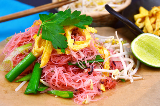 Thai street food menu Pink Stir-fried Rice Noodles (Thai name is Pad mee chompoo)