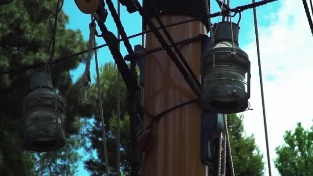 Two Lanterns Attached To The Mast Of A 17th Century Sailing Ship