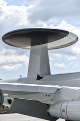 Huge radar antenna on a military airplane