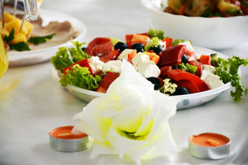 Sliced vegetables on a plate. Salad. Mixed vegetables