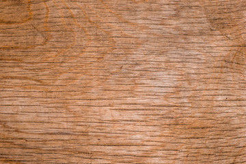 Horizontal lines on old cracked weathered surface of plywood as texture and background