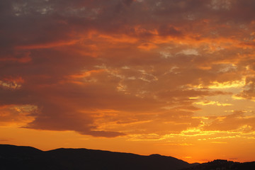 Orange cloudy sky during a sunset