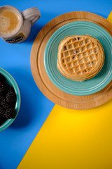 Waffles with raspberries and blackberries for breakfast
