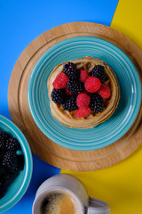 Waffles with raspberries and blackberries for breakfast