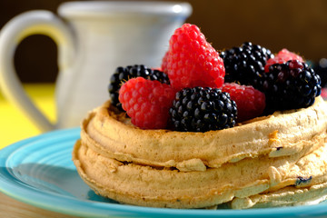 Waffles with raspberries and blackberries for breakfast