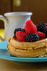 Waffles with raspberries and blackberries for breakfast